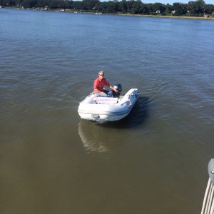 Tom coming back from taking out the trash, boat style !