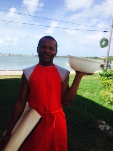 Delivering the freshly tenderized by pounding conch 
