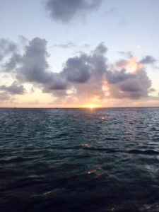 Peaceful sunset just before full moon rise